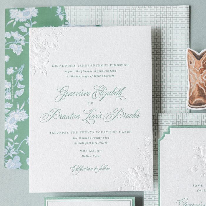 Braxton v2 wedding invitation set with floral design and cowboy boots on a light gray background