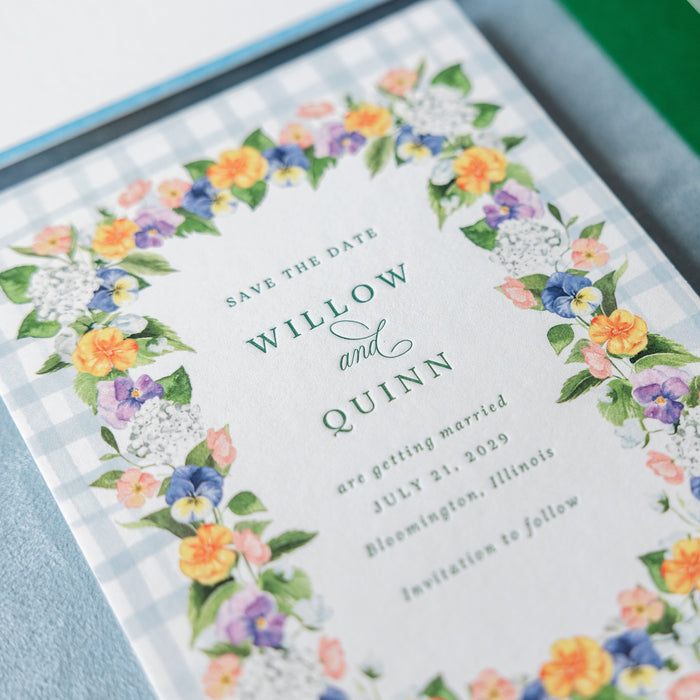 Hadaway v2 Save the Date card with floral design and 'Save the Date' text on a blue background