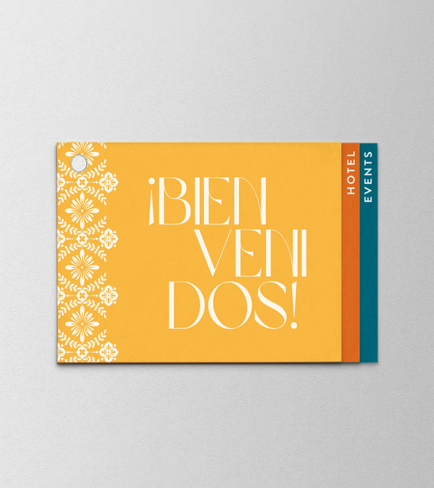 Colorful info booklet with '¡BIENvenidos!' text on a gray background