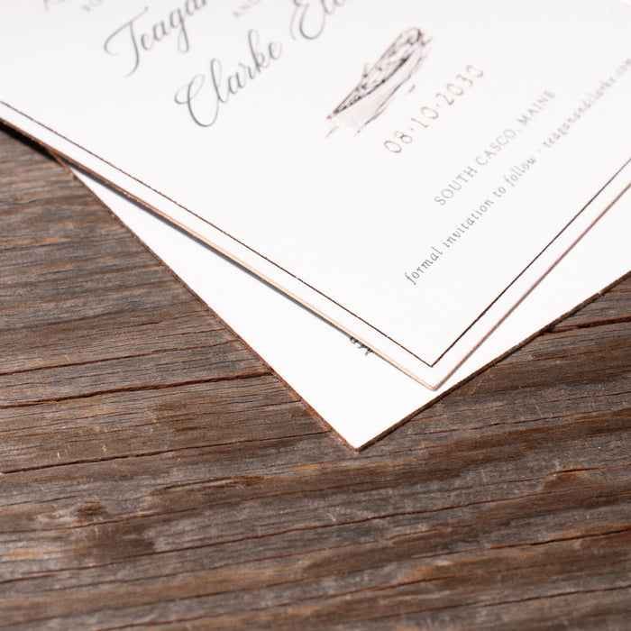 White card with text on a wooden surface