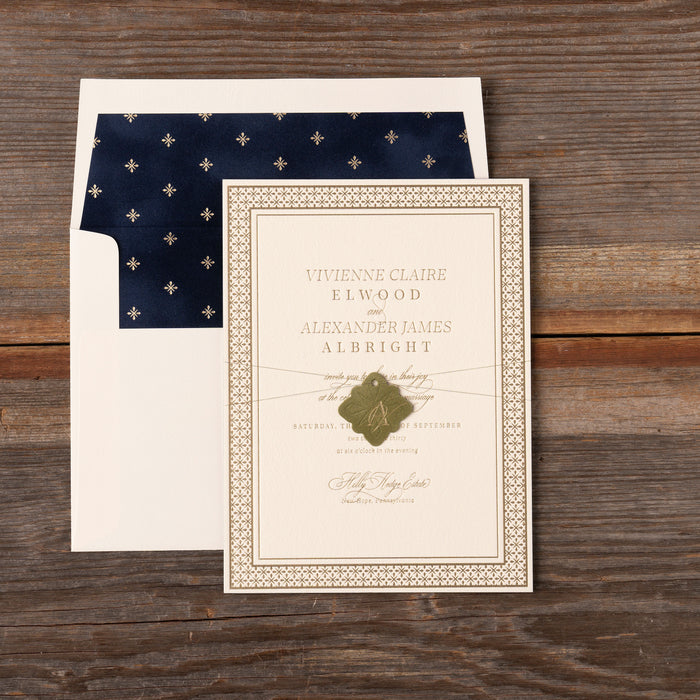 Albright Wedding invitation card with navy velvet envelope liner on a wooden surface