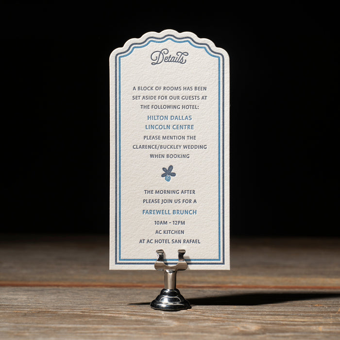 Astrid details card on a stand with a dark background