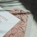 Detail of foil edge on Celina wedding invitation card