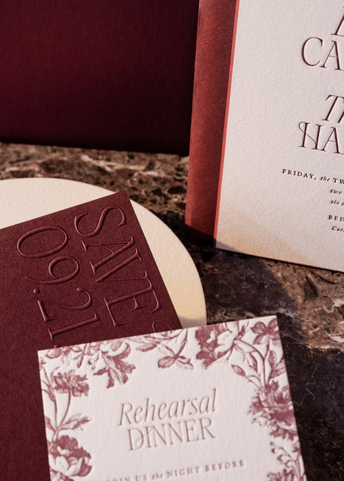 detail of harkness save the date embossing