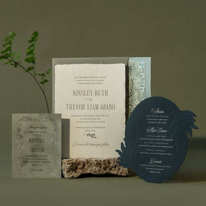Kinsley Wedding Invitation Suite on Green background