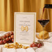 Italo wedding invitation card with red wine, grapes, and pasta on a yellow background