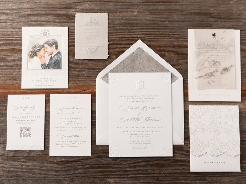 Bianca Wedding Invitation suite on wood background