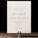 Braxton v2 Wedding invitation card on a stand with a dark background