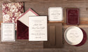 Canfield wedding invitation suite on wooden surface