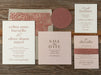 Celina wedding invitation suite on a wooden surface