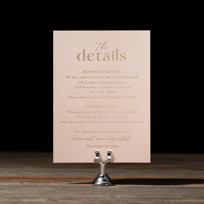 Celina details card on a stand against a dark background
