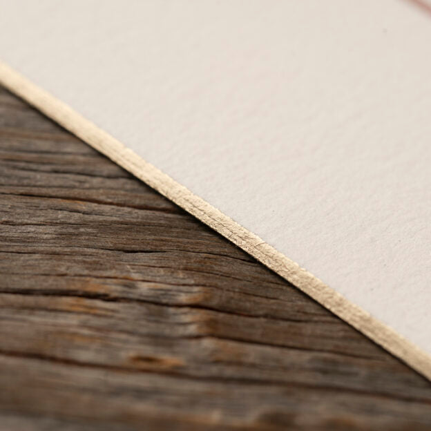 closeup of celina wedding invitation foil edge