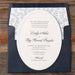 Gellert wedding invitation card with navy envelope on a wooden surface