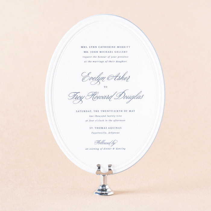 Elegant Gellert wedding invitation on a stand with a beige background