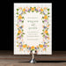 Floral save the date card on a stand with a dark background