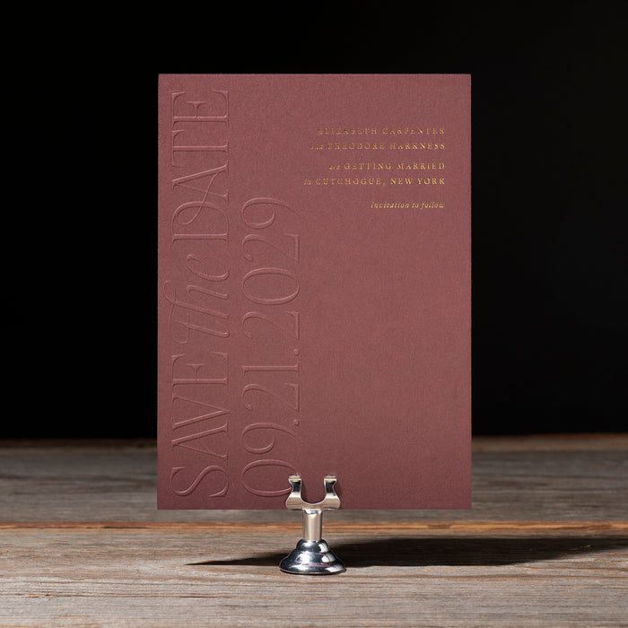 Harkness Save the Date card on dark background