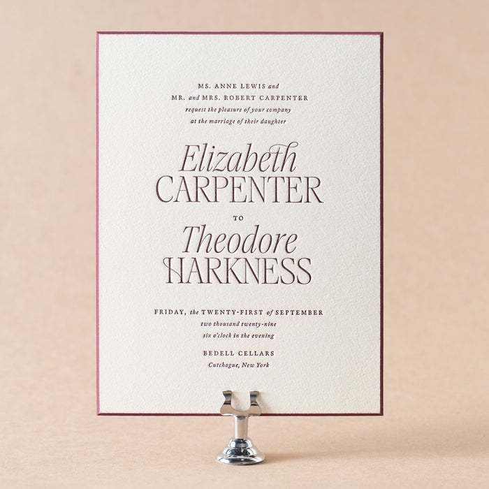 Harkness wedding invitation with elegant text on a beige background