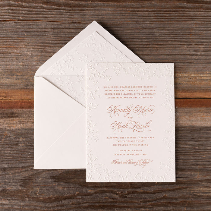 Heaton Wedding invitation card with envelope on a wooden surface