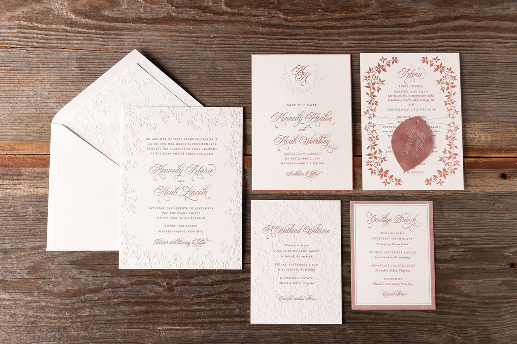 Heaton Wedding invitation set with envelopes on a wooden surface