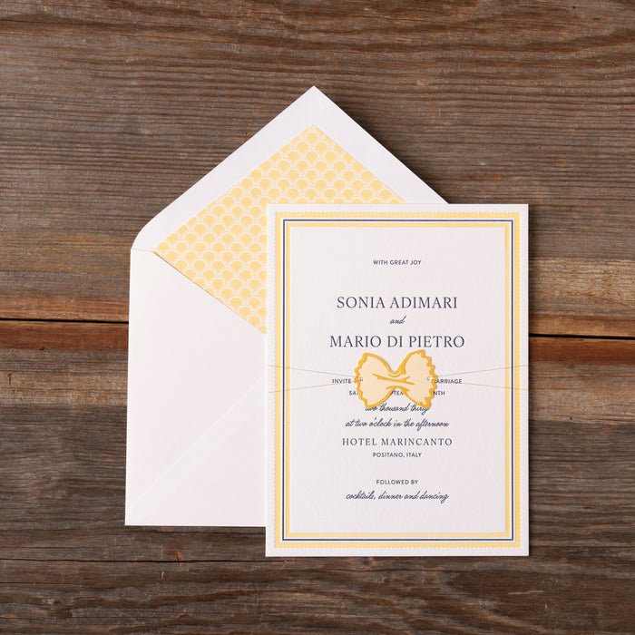Italo wedding invitation card with envelope on a wooden surface