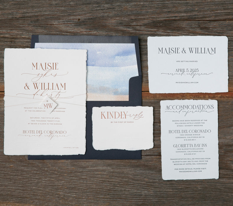 Set of wedding invitations on a wooden surface
