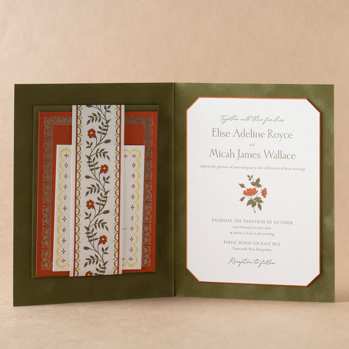 Decorative Royce wedding invitation with floral patterns on a beige background