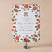 Floral Royce save the date card on a stand with a beige background