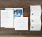 Ryann suite of wedding invitations with nautical theme on a wooden surface