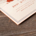 Corner detail of Scout wedding invitation