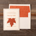 Scout Invitation card with red maple leaf design on a wooden surface