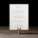 Sedna Menu card with text on a stand against a dark background