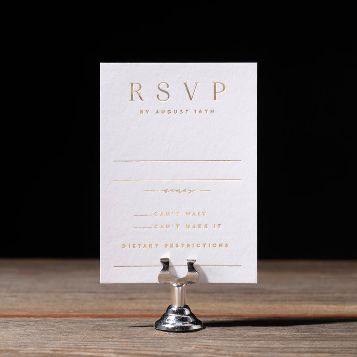 Selene RSVP card on a stand with a black background