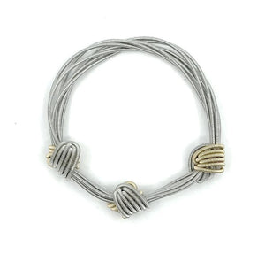 Piano Wire Bracelet with Silver and Gold Knots